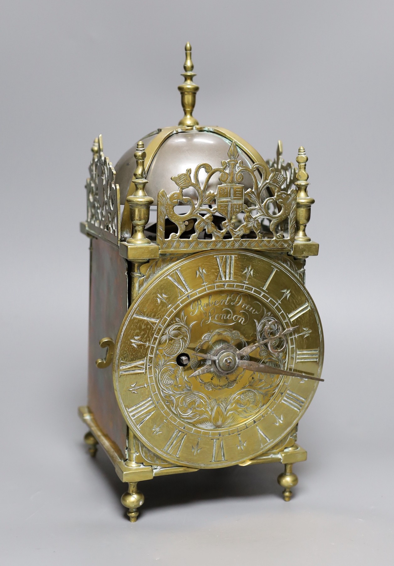 A brass lantern clock, signed Robert Drew, London, single fusee movement, 34 cms high